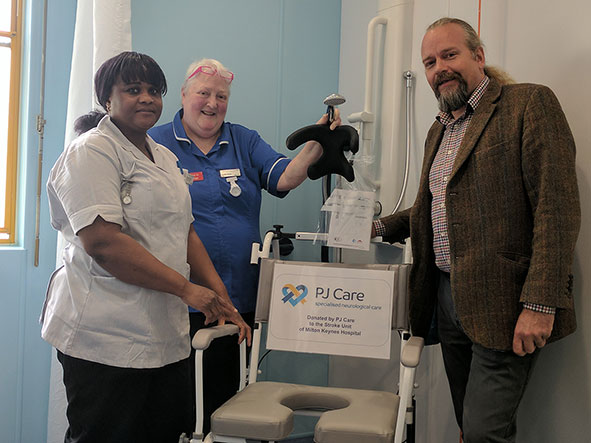 P J Care, donate a shower chair to the Stroke Unit at MK Hospital