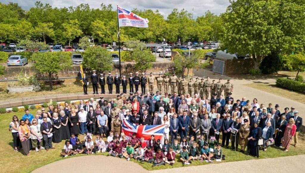 Armed Forces Day event in Milton Keynes with crowds and military representatives